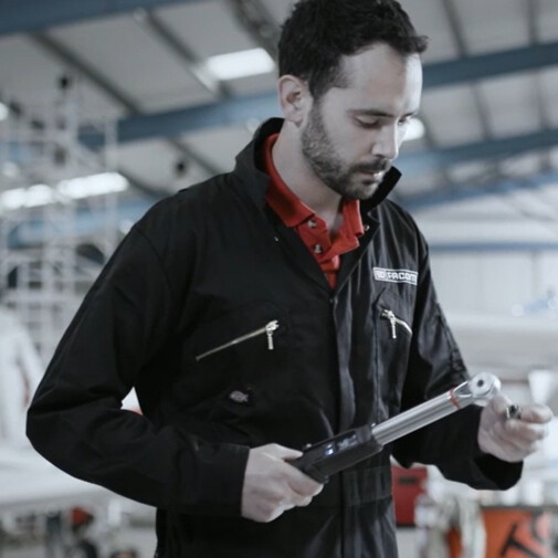 Aeronautical engineer using a FACOM torque wrench